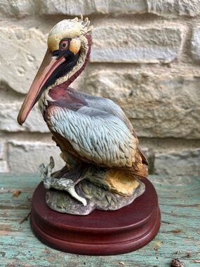 Vintage porcelain figurine of a brown pelican from Andrea by Sadek